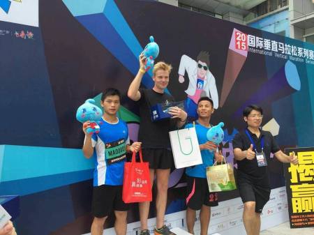 Beyond Human salutes his victory from the top of the winner's podium